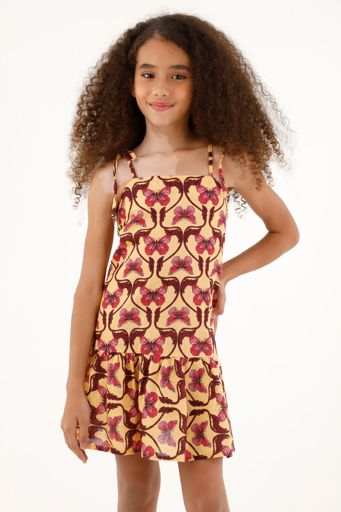 Vestido estampado con bolero en ruedo para niña