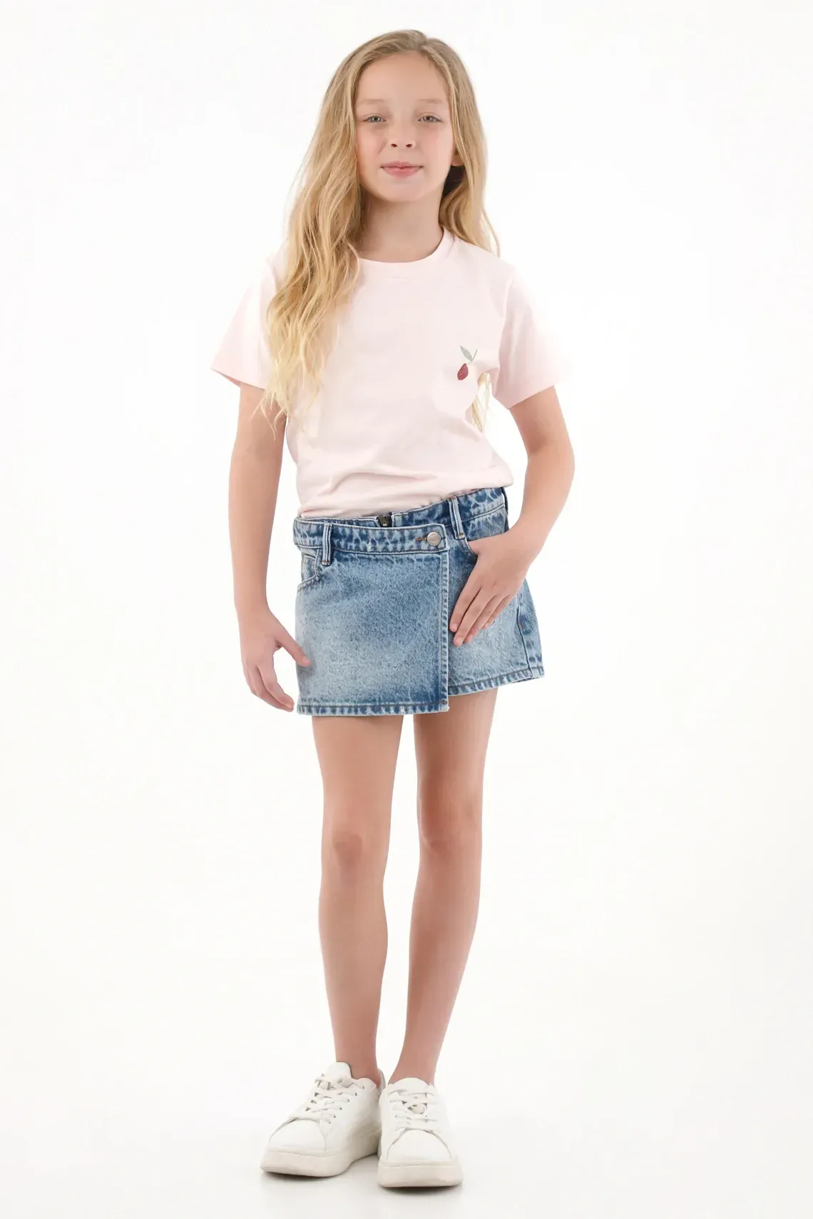 Falda corta en denim tono medio azul para niña