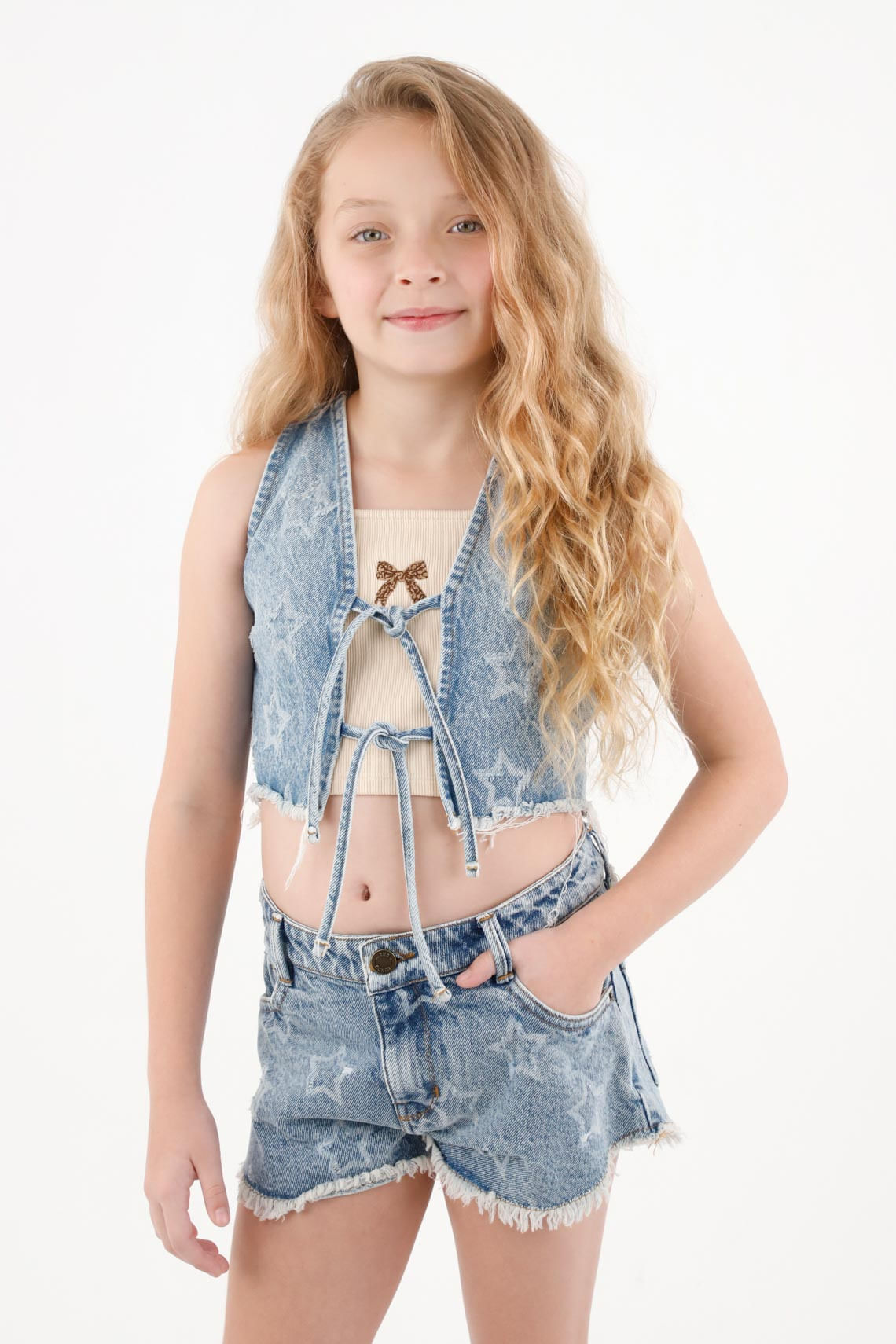 Chaleco en denim con estrella para niña