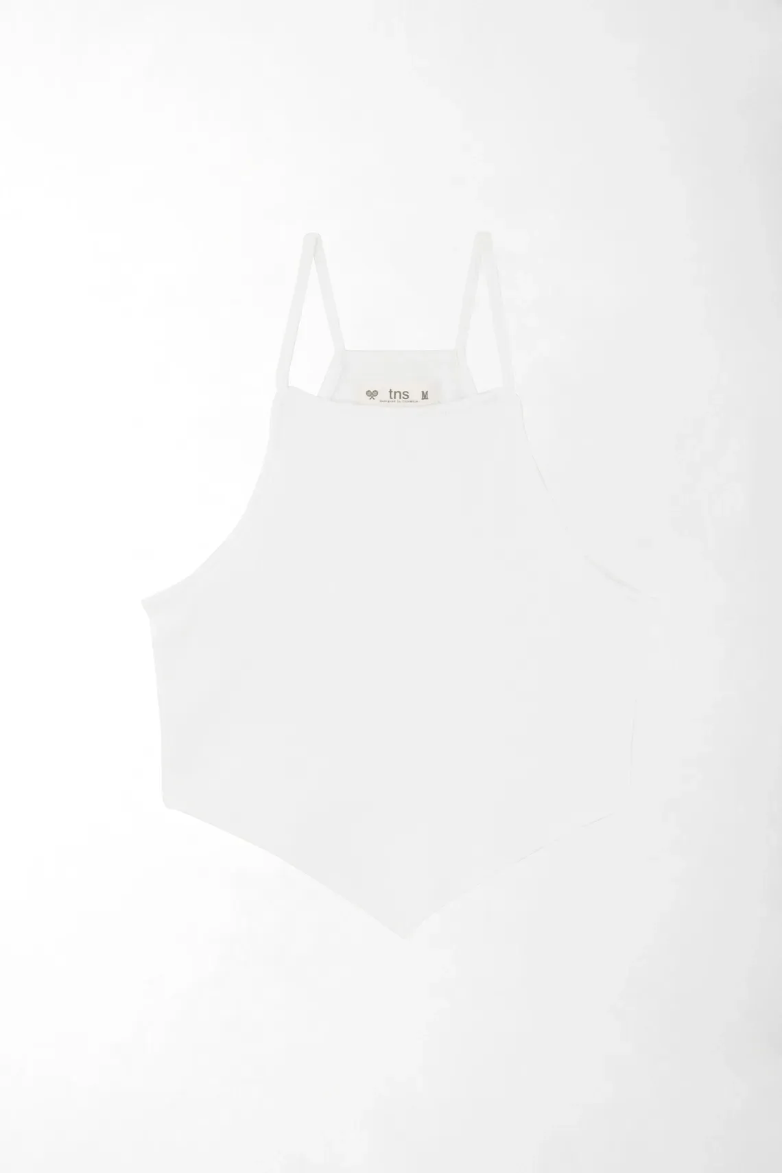 Top ajustado con bajo pañuelo en algodón blanco para mujer